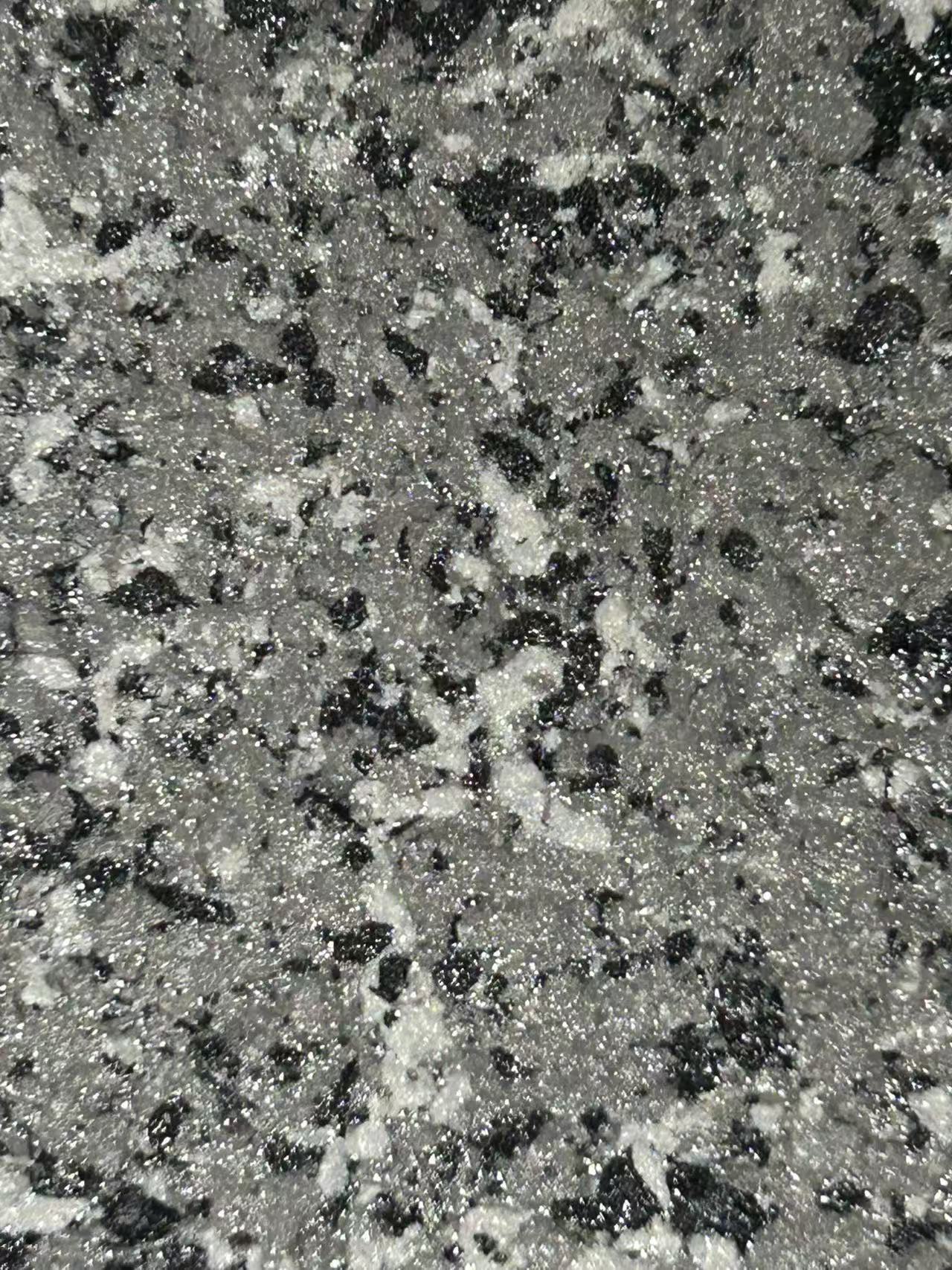Featherstone Prestige Bluestone Finish - Mixed gray texture with white aggregate